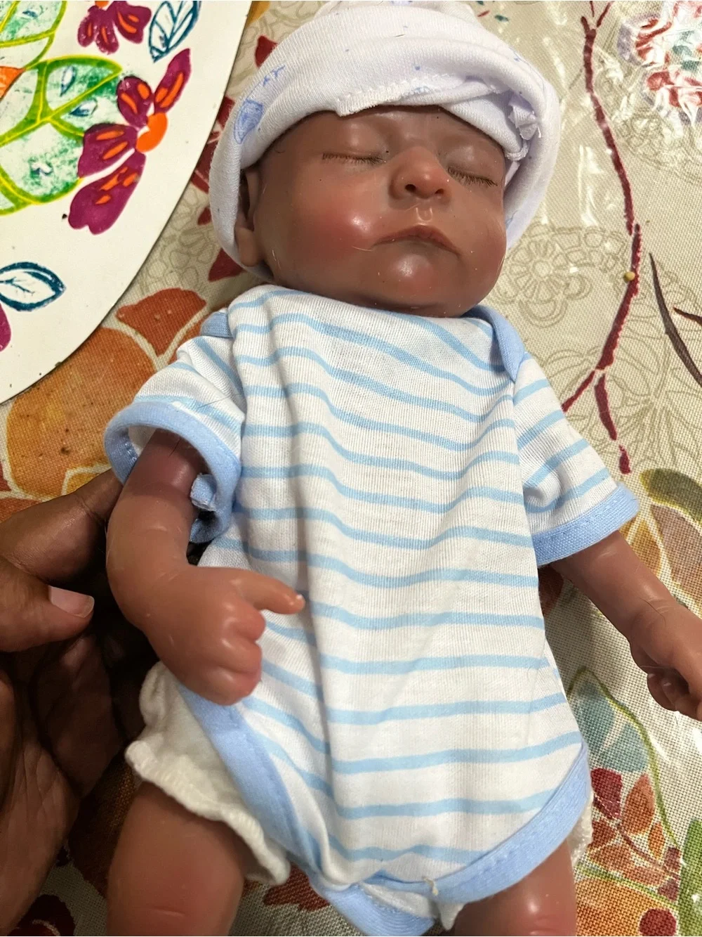 Reborn Brown Baby Doll with Blue & White Striped Outfit